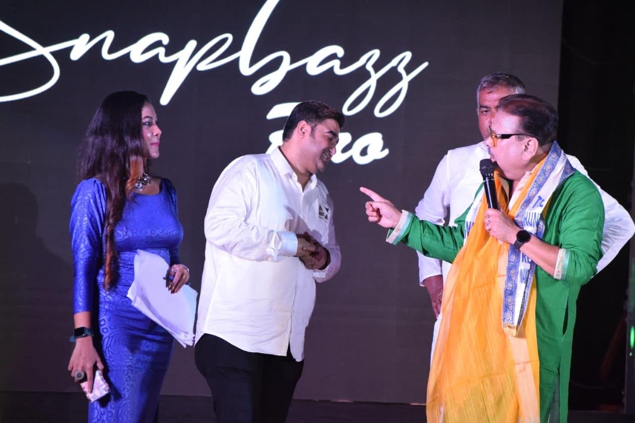 On stage at a Kolkata media and entertainment event.